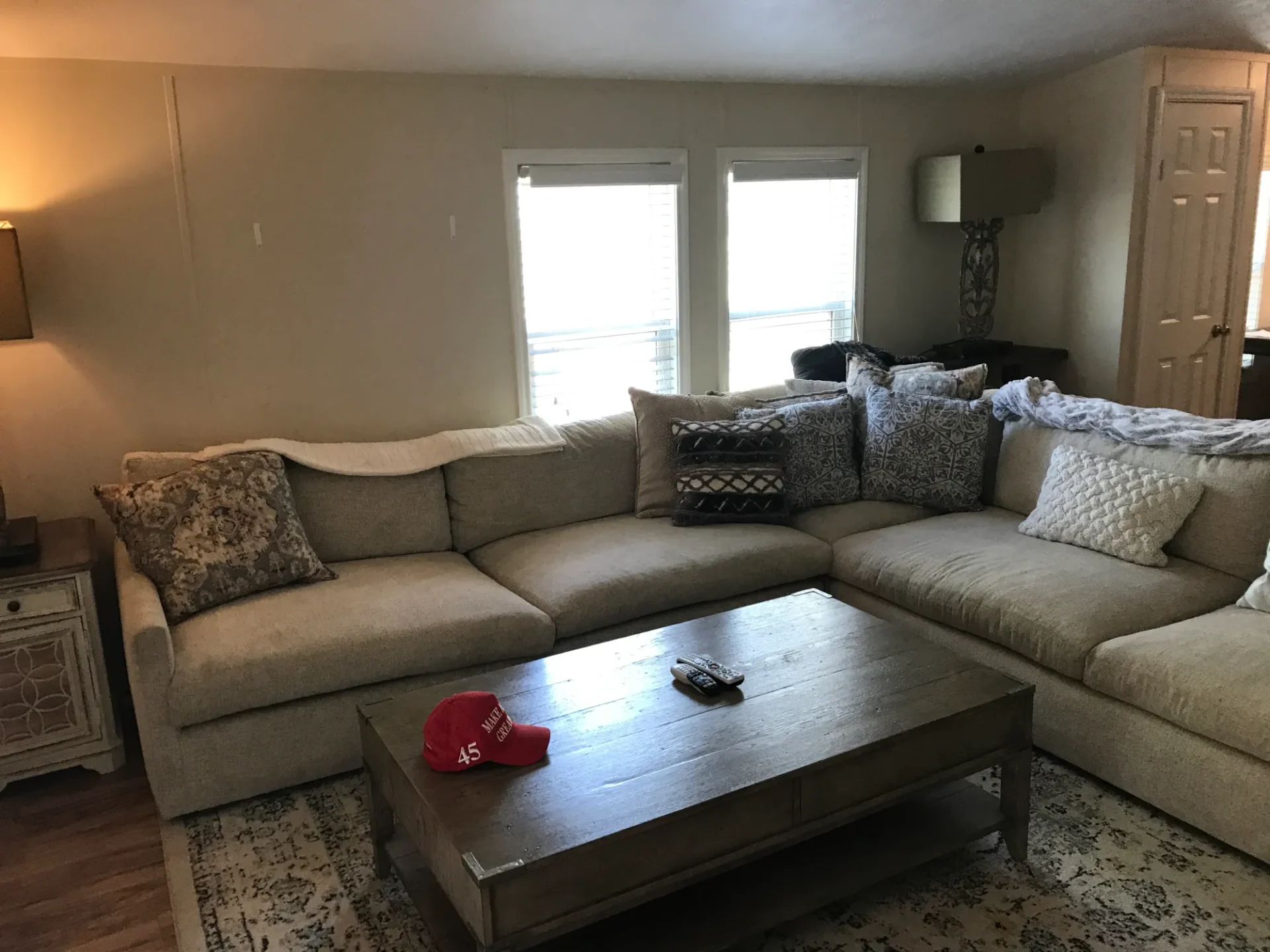 A living room with a couch and coffee table